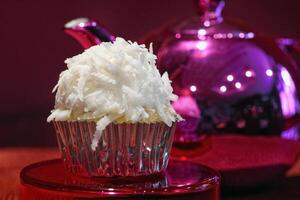 vanilla cupcakes with grated coconut photo