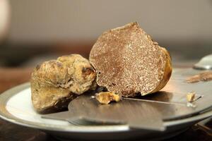 fresh bianco tartufo on the plate photo