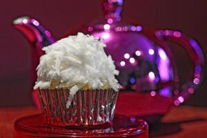 vanilla cupcakes with grated coconut photo