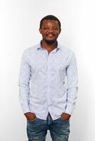 Happy african american black man with small beard in casual bright shirt isolated white background photo