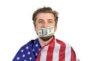 Money on man mouth photo