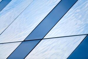 Blue glass ceiling, roof, wall, facade. Close up photo