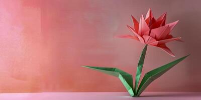 elegante coral origami flor en suave rosado fondo foto