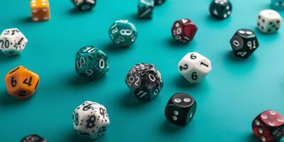 Collection of Various Dice on a Turquoise Background photo