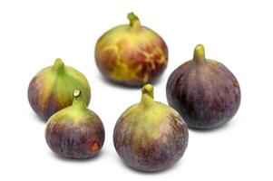 Isolated figs. One and a half fresh fig fruits isolated on white background 2 photo