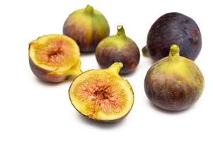 Fresh figs. Fruit with half and quarter isolated on white background. With clipping path. 4 photo