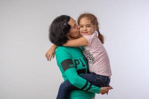 mother and daughter studio portrait happy family 1 photo