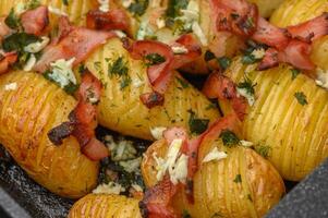 baked potatoes with bacon in the kitchen 7 photo