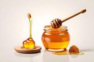 glass jar full of honey and dipper isolated on white background photo