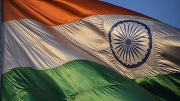 India flag flying high at Connaught Place with pride in blue sky, India flag fluttering, Indian Flag on Independence Day and Republic Day of India, tilt up shot, Waving Indian flag, Har Ghar Tiranga video