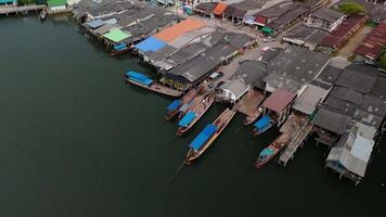 Drone the pier transporting a motorcycle to Koh jum, Thailand video