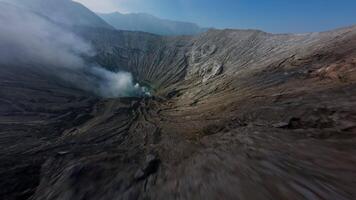 Flying inside the active mouth of the volcano FPV drone video