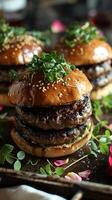 Gourmet Burgers Topped with Fresh Greens Amidst a Floral Ambiance photo