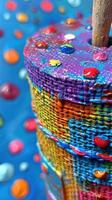 Vibrant Carousel of Colors. A Close-Up of a Colorful, Textured Surface Adorned with Glossy Droplets photo