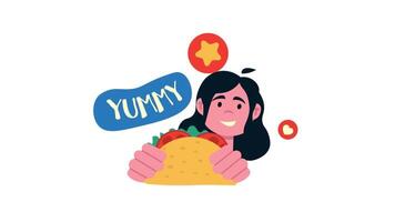 a woman holding a taco with the word yummy written on it video