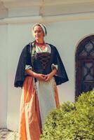 Portrait of brunette woman dressed in historical Baroque clothes photo