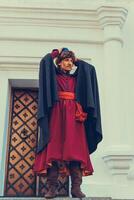 Portrait of a man in a medieval middle class costume. Retro style and historical clothes concepts photo