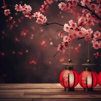 Chinese lanterns and pink flowers on the tree festival during Chinese new year festival, Selective Focus on transparency background on wood photo