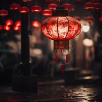 un rojo chino linternas colgando en el cuerdas alrededor un calle a noche, fondo de pantalla, postales en oscuro azul antecedentes foto