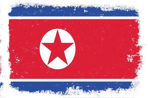 Vintage flat design grunge North Korea flag background vector