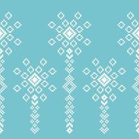 Traditional ethnic motifs ikat geometric fabric pattern cross stitch.Embroidery Ethnic oriental Pixel pastel cute blue background. Abstract,illustration. Texture,decoration,wallpaper. vector