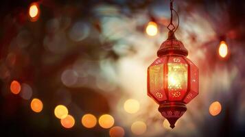 A traditional Islamic lantern, known as a fanous, emits a warm glow against a bokeh light background, symbolizing the festive spirit of the Islamic New Year photo