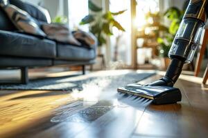 a woman is using a vacuum on a floor photo