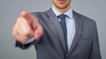 Businessman Pointing at Viewer photo