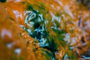 Sulfur water is orange and green photo