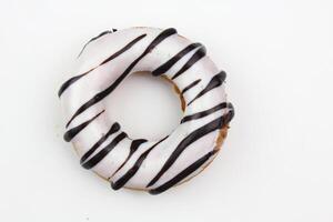 Apetite donut with caramel glaze on white background, isolate photo