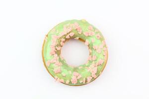 Apetite donut with caramel glaze on white background, isolate photo