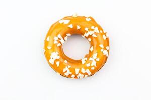 Apetite donut with caramel glaze on white background, isolate photo