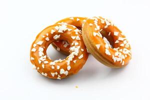 Apetite donut with caramel glaze on white background, isolate photo