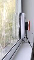 Robot window cleaner is an innovative device for automatic glass cleaning. video