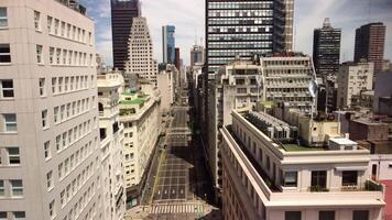 Downtown buildings in Buenos Aires, city street, view from drone. Argentina road video