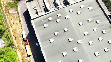 Flight over the roof of an industrial building in Rennes France video