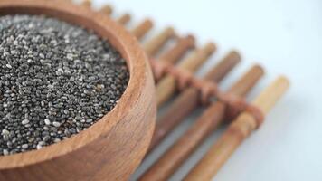 close up of chia seed in a container , video