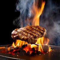 Hot grilled meat cooking on flames photo