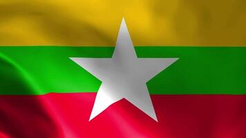 myanmar flagga fladdrande i de vind. detaljerad tyg textur. sömlös looped animation. video