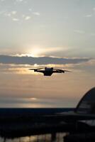 Golden Horizons, Close-Up Drone Flying Sunrise Bokeh in Sky Above Taiwan Ocean photo