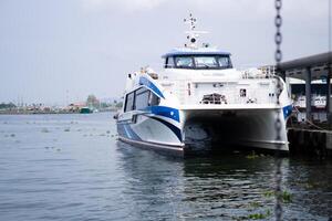 Coastal Maritime View, Pier, Jetty Harbouring Ferry Ships in Taiwan Kaohshiung photo