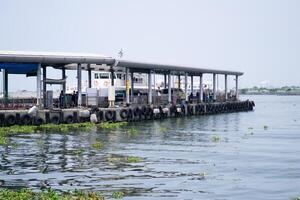 Coastal Maritime View, Pier, Jetty Harbouring Ferry Ships in Taiwan Kaohshiung photo