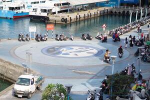 Coastal Maritime View, Pier, Jetty Harbouring Ferry Ships in Taiwan Kaohshiung photo