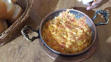 Turkish Menemen omelet in a frying pan. . video