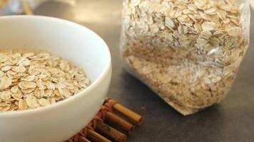 roasted oats flakes in a bowl on table video