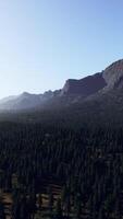 Landscape view of the mountain range with trees in the fall video