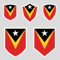 Set of East Timor Flag in Shield Shape Frame vector