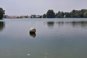 Tasik Biru is a serene blue lake, nestled in a scenic landscape, is a recreational haven just 30 minutes from Kuala Lumpur, drawing tourists with its natural allure. photo