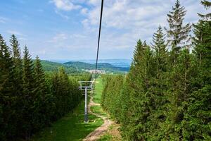 Mountains with open cable cars lift, Karpacz, Poland photo