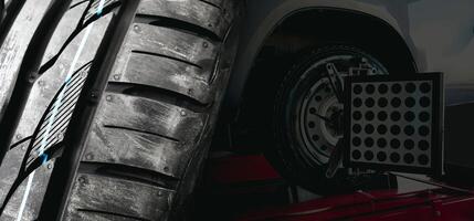 Car tire tread and car wheel alignment at the auto repair shop , double exposure , Car maintenance concept photo